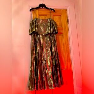 Metallic, pleated party dress from JCrew. Never worn, tags still attached. Zips!